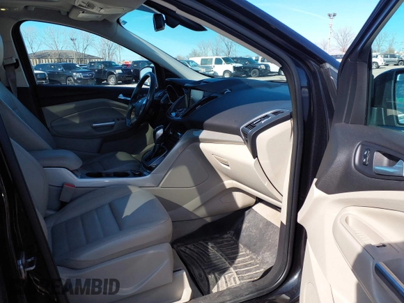 2013 Ford Escape SEL with VIN 1FMCU9HX1DUA20307, listed as a IAAI auction lot 41933873 with 164,962 mi miles. Bid and sale history available at carsss.com. Image 5.