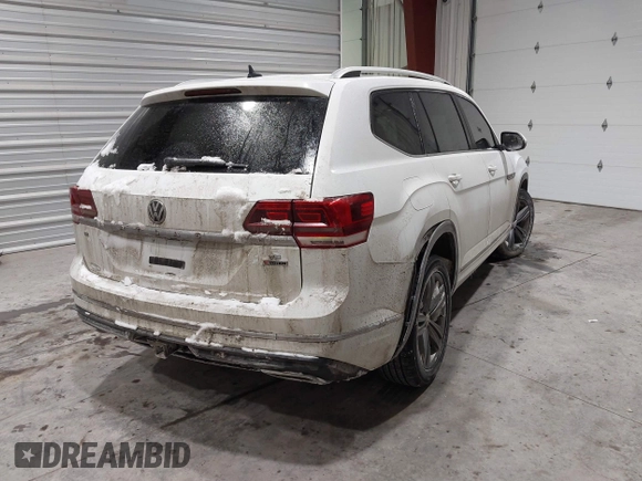 2019 Volkswagen Atlas SE z VIN 1V2XR2CA0KC595596, wystawiony jako IAAI lot #41410019 z przebiegiem 103 336 mil mil oraz . Historia ofert i sprzedaży dostępna na DreamBid. Obrazek 4.