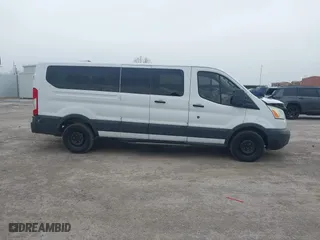 2016 Ford Transit Wagon XL with VIN 1FBZX2ZM8GKA32850, listed as a IAAI auction lot 41486164 with 296,493 mi miles. Bid and sale history available at carsss.com. Image 13.