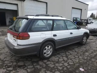 1996 Subaru Legacy Outback with VIN 4S3BG6850T7971454, listed as a Copart auction lot 52082395 with 173,542 mi miles and Salvage title. Bid and sale history available at DreamBid. Image 3.