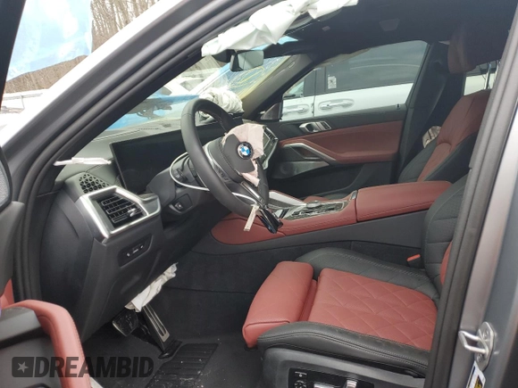 2025 BMW X6 M60i with VIN 5UX43EX01S9X34140, listed as a Copart auction lot 82425694 with 6,844 mi miles and Salvage Title. Bid and sale history available at carsss.com. Image 7.