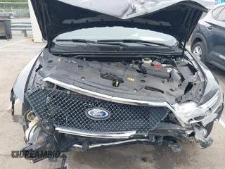 2015 Ford Taurus SEL with VIN 1FAHP2E81FG163058, listed as a IAAI auction lot 42221098 with 127,957 mi miles and . Bid and sale history available at carsss.com. Image 10.