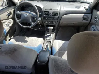 2003 Nissan Sentra XE with VIN 3N1CB51D83L695196, listed as a Copart auction lot 52225155 with 138,570 mi miles and Salvage Title. Bid and sale history available at DreamBid. Image 8.