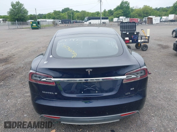 2014 Tesla Model S 60 with VIN 5YJSA1H19EFP32063, listed as a IAAI auction lot 42360872 with 103,495 mi miles and . Bid and sale history available at DreamBid. Image 16.