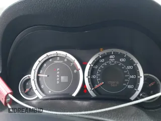 2009 Acura TSX z VIN JH4CU26609C006240, wystawiony jako IAAI lot #41721575 z przebiegiem 172 916 mil mil oraz . Historia ofert i sprzedaży dostępna na DreamBid. Obrazek 7.