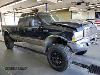 1999 Ford Super Duty F-250 XL with VIN 1FTNX21F0XEC99244, listed as a Copart auction lot 72545104 with 264,697 mi miles and Salvage Title. Bid and sale history available at carsss.com. Image 4.