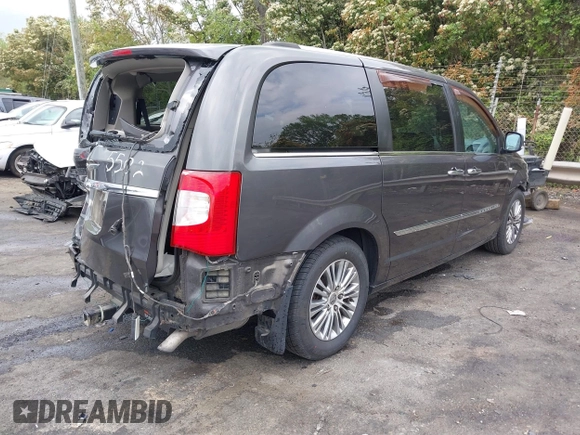 2014 Chrysler Town & Country Touring L with VIN 2C4RC1CG6ER195502, listed as a IAAI auction lot 42009629 with 126,157 mi miles and . Bid and sale history available at DreamBid. Image 4.