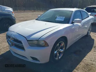 2014 Dodge Charger SXT with VIN 2C3CDXHG8EH117439, listed as a IAAI auction lot 41458304 with 189,041 mi miles and . Bid and sale history available at DreamBid. Image 18.