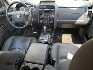 2010 Mazda Tribute Grand Touring with VIN 4F2CY0C78AKM03177, listed as a Copart auction lot 66729164 with 75,400 mi miles and Salvage Title. Bid and sale history available at carsss.com. Image 8.