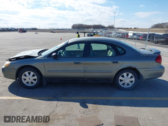 2003 Ford Taurus SES Standard with VIN 1FAFP55283G168564, listed as a IAAI auction lot 41884130 with 199,923 mi miles and . Bid and sale history available at DreamBid. Image 14.