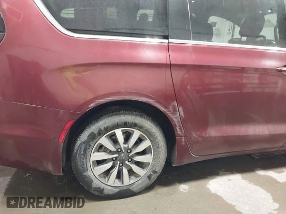 2021 Chrysler Pacifica Hybrid Touring L with VIN 2C4RC1L71MR581260, listed as a IAAI auction lot 42014401 with 68,719 mi miles and . Bid and sale history available at DreamBid. Image 6.