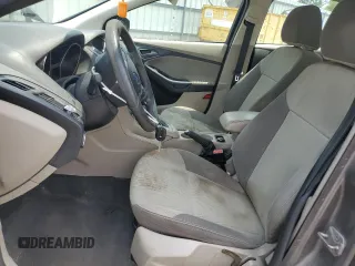 2012 Ford Focus SE z VIN 1FAHP3F22CL431070, wystawiony jako Copart lot #59569925 z przebiegiem 222 295 mil mil oraz Szkoda całkowita • Salvage title. Historia ofert i sprzedaży dostępna na DreamBid. Obrazek 7.