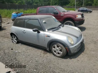 2006 MINI Hardtop z VIN WMWRC33546TK65323, wystawiony jako Copart lot #58930785 z przebiegiem 173 105 mil mil oraz Szkoda całkowita • Salvage title. Historia ofert i sprzedaży dostępna na DreamBid. Obrazek 4.