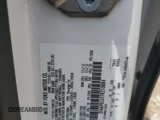 2015 Ford Fusion SE Hybrid with VIN 3FA6P0LU1FR210884, listed as a Copart auction lot 60035595 with 125,798 mi miles and Salvage title. Bid and sale history available at DreamBid. Image 12.