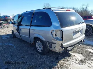 2001 Chrysler Town & Country with VIN 2C8GP44301R304800, listed as a IAAI auction lot 41433836 with Not Provided miles and . Bid and sale history available at DreamBid. Image 3.