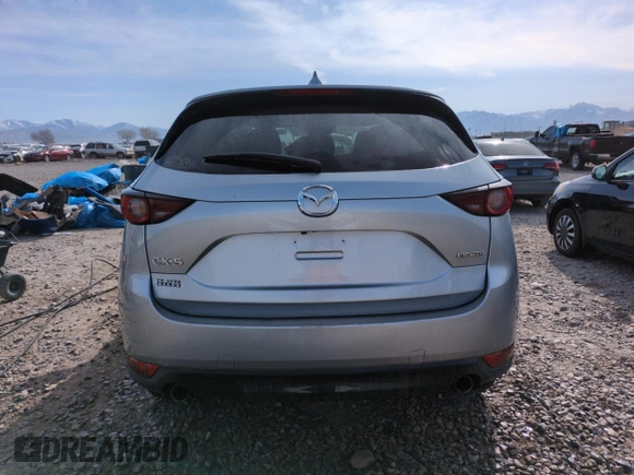 2020 Mazda CX-5 Touring with VIN JM3KFBCMXL0767254, listed as a Copart auction lot 52189335 with 96,922 mi miles and Salvage Title. Bid and sale history available at carsss.com. Image 6.