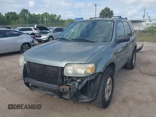2007 Ford Escape XLT with VIN 1FMYU03187KA16422, listed as a IAAI auction lot 42168052 with 189,757 mi miles and . Bid and sale history available at DreamBid. Image 2.