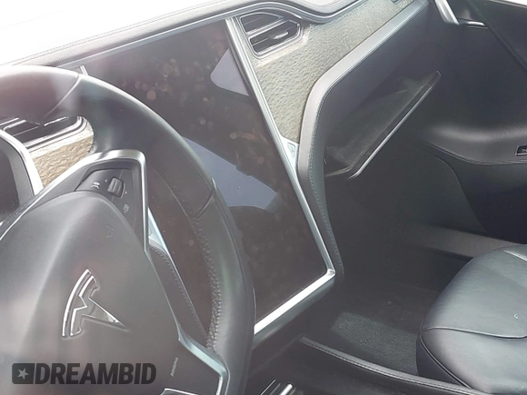 2013 Tesla Model S с VIN 5YJSA1CN1DFP08848, выставлен на аукционе IAAI как лот 42300243 с пробегом Не указан миль и . История ставок и продаж доступна на DreamBid. Изображение 17.
