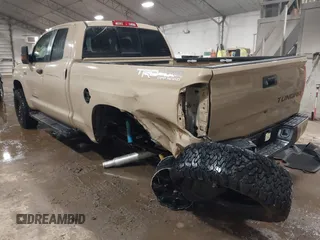 2017 Toyota Tundra SR z VIN 5TFUY5F19HX583033, wystawiony jako IAAI lot #41484920 z przebiegiem 112 206 mil mil oraz . Historia ofert i sprzedaży dostępna na DreamBid. Obrazek 3.