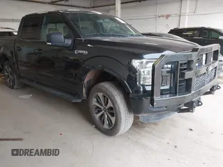2015 Ford F-150 XLT with VIN 1FTEW1EPXFKE99354, listed as a IAAI auction lot 42245005 with 160,164 mi miles and . Bid and sale history available at DreamBid. Image 1.