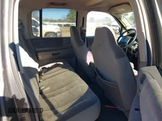 2003 Dodge Dakota SLT with VIN 1D7HL48X03S174569, listed as a IAAI auction lot 41159169 with 156,551 mi miles. Bid and sale history available at carsss.com. Image 8.