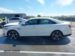 2016 Ford Taurus SEL with VIN 1FAHP2E88GG131659, listed as a IAAI auction lot 42205065 with 99,416 mi miles and . Bid and sale history available at DreamBid. Image 14.