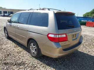 2006 Honda Odyssey EX-L with VIN 5FNRL38666B410188, listed as a IAAI auction lot 42004957 with 156,584 mi miles. Bid and sale history available at carsss.com. Image 3.