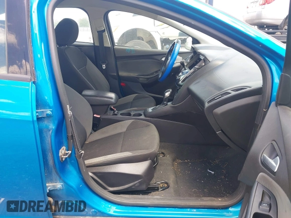 2013 Ford Focus SE z VIN 1FADP3F29DL300041, wystawiony jako IAAI lot #42361903 z przebiegiem 160 537 mil mil oraz . Historia ofert i sprzedaży dostępna na DreamBid. Obrazek 5.