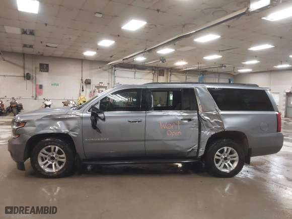 2019 Chevrolet Suburban LT with VIN 1GNSKHKC3KR195042, listed as a IAAI auction lot 41704591 with 107,166 mi miles. Bid and sale history available at carsss.com. Image 14.