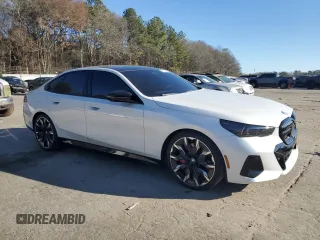 2024 BMW i5 M60 with VIN WBY43FK00RCP86174, listed as a Copart auction lot 45522685 with 7,392 mi miles and Salvage title. Bid and sale history available at DreamBid. Image 4.