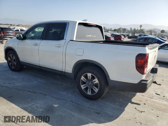 2017 Honda Ridgeline RTL-T with VIN 5FPYK2F65HB011097, listed as a Copart auction lot 63687965 with 186,157 mi miles and Salvage title. Bid and sale history available at DreamBid. Image 2.