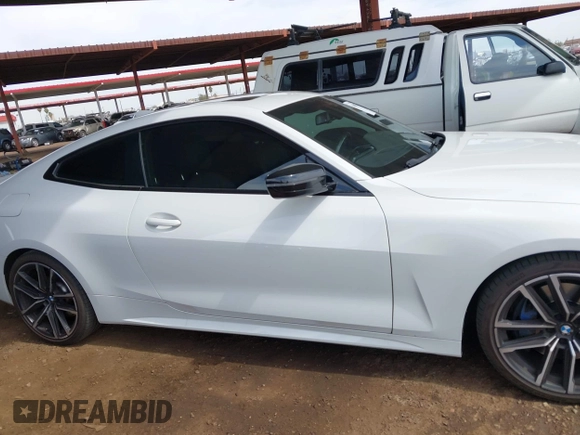 2021 BMW 4 Series M440i xDrive with VIN WBA13AR09MCF74685, listed as a IAAI auction lot 41881537 with 43,400 mi miles and . Bid and sale history available at DreamBid. Image 13.