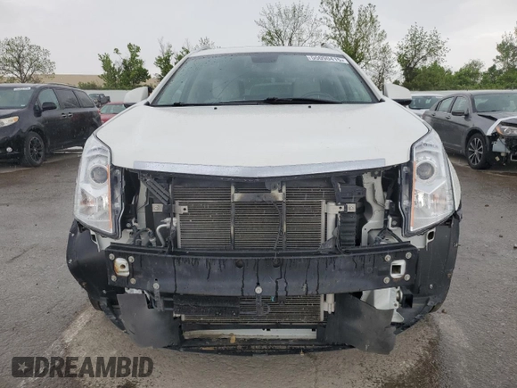 2012 Cadillac SRX Luxury Collection z VIN 3GYFNAE34CS648291, wystawiony jako Copart lot #55090415 z przebiegiem 103 286 mil mil oraz Szkoda całkowita • Salvage title. Historia ofert i sprzedaży dostępna na DreamBid. Obrazek 5.