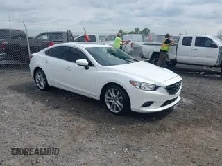 2016 Mazda Mazda6 i Touring with VIN JM1GJ1V56G1448334, listed as a IAAI auction lot 42075222 with 52,883 mi miles. Bid and sale history available at carsss.com. Image 1.
