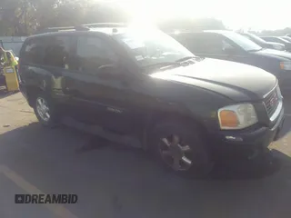 2005 GMC Envoy SLE z VIN 1GKDT13S352354641, wystawiony jako IAAI lot #31188420 z przebiegiem Nie podano mil oraz . Historia ofert i sprzedaży dostępna na DreamBid. Obrazek 1.