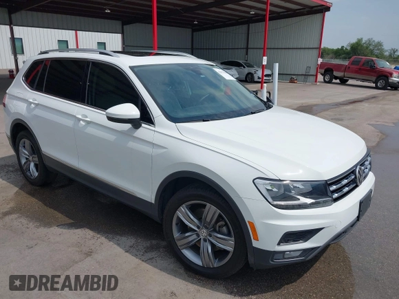 2020 Volkswagen Tiguan SE z VIN 3VV3B7AX4LM032609, wystawiony jako IAAI lot #42074359 z przebiegiem 52 404 mil mil oraz . Historia ofert i sprzedaży dostępna na DreamBid. Obrazek 1.