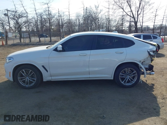 2021 BMW X4 xDrive30i z VIN 5UX2V1C01M9F26524, wystawiony jako IAAI lot #41805153 z przebiegiem 40 353 mil mil oraz . Historia ofert i sprzedaży dostępna na DreamBid. Obrazek 15.