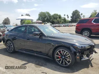 2024 BMW i4 M50 with VIN WBY33AW09RFS37404, listed as a Copart auction lot 51594984 with 776 mi miles and Salvage Title. Bid and sale history available at carsss.com. Image 4.
