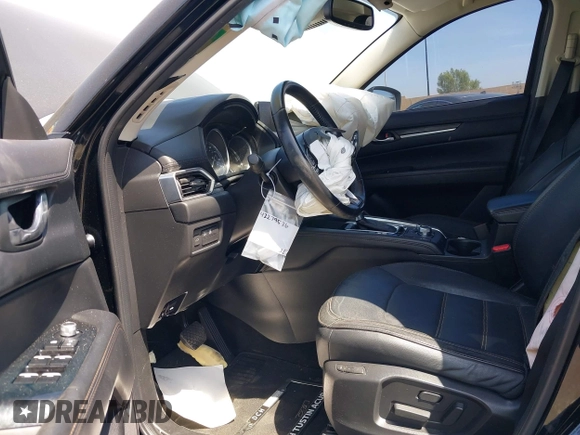 2018 Mazda CX-5 Grand Touring z VIN JM3KFADM7J0327272, wystawiony jako IAAI lot #42279536 z przebiegiem 97 478 mil mil oraz . Historia ofert i sprzedaży dostępna na DreamBid. Obrazek 5.