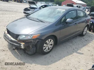 2012 Honda Civic LX z VIN 2HGFB2F59CH301404, wystawiony jako Copart lot #60069805 z przebiegiem 117 630 mil mil oraz Czysty tytuł • Clean title. Historia ofert i sprzedaży dostępna na DreamBid. Obrazek 1.