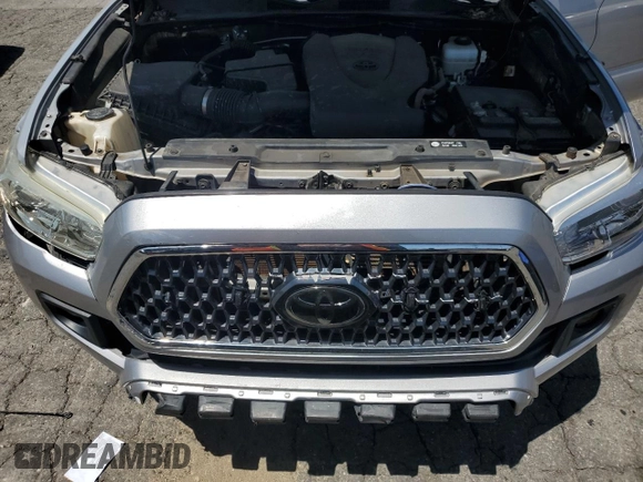 2019 Toyota Tacoma SR with VIN 3TMCZ5AN2KM277551, listed as a Copart auction lot 61586585 with 59,670 mi miles and Salvage title. Bid and sale history available at DreamBid. Image 11.