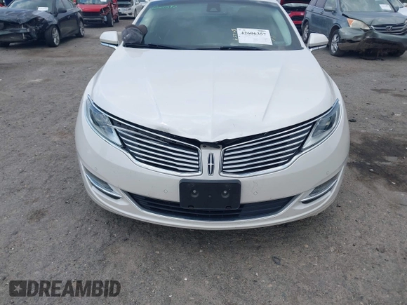 2014 Lincoln MKZ Hybrid z VIN 3LN6L2LU2ER825732, wystawiony jako IAAI lot #42606357 z przebiegiem 153 966 mil mil oraz . Historia ofert i sprzedaży dostępna na DreamBid. Obrazek 13.