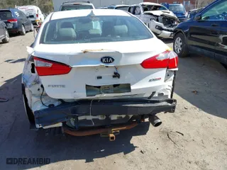 2014 Kia Forte EX with VIN KNAFZ4A85E5096324, listed as a IAAI auction lot 41704435 with 138,311 mi miles. Bid and sale history available at carsss.com. Image 6.