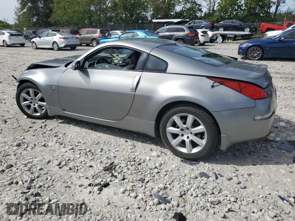 2005 Nissan 350Z with VIN JN1AZ34D05M606703, listed as a Copart auction lot 69631414 with 133,519 mi miles and Salvage Title. Bid and sale history available at DreamBid. Image 2.