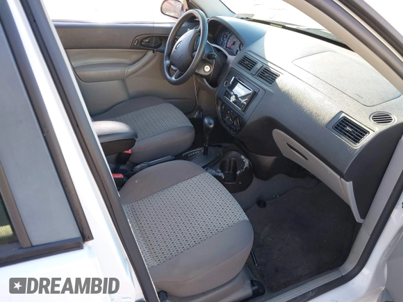 2007 Ford Focus S with VIN 1FAHP34N67W244433, listed as a IAAI auction lot 41539078 with 107,318 mi miles and . Bid and sale history available at DreamBid. Image 5.