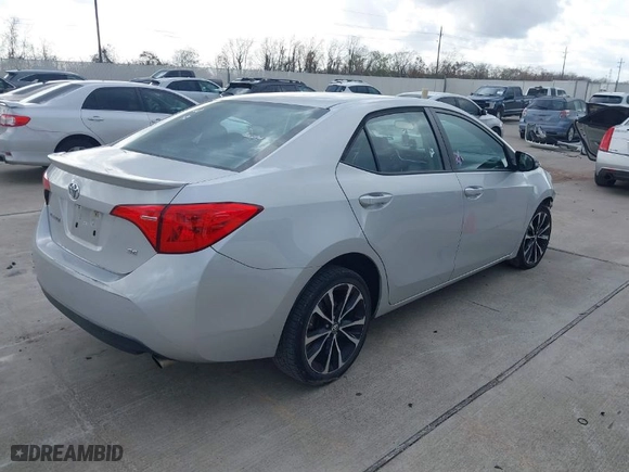2019 Toyota Corolla L with VIN 5YFBURHE3KP927911, listed as a IAAI auction lot 41190817 with 105,648 mi miles. Bid and sale history available at carsss.com. Image 4.