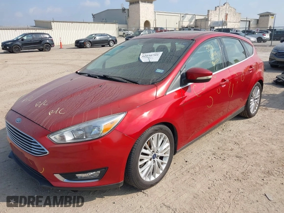 2018 Ford Focus Titanium z VIN 1FADP3N24JL313938, wystawiony jako IAAI lot #42050701 z przebiegiem 162 859 mil mil oraz . Historia ofert i sprzedaży dostępna na DreamBid. Obrazek 2.