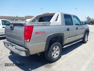 2003 Chevrolet Avalanche z VIN 3GNEC13T03G283368, wystawiony jako IAAI lot #42642951 z przebiegiem 177 383 mil mil oraz . Historia ofert i sprzedaży dostępna na DreamBid. Obrazek 4.