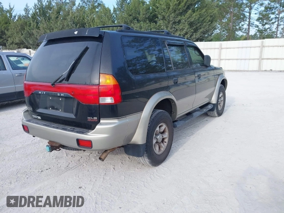 1999 Mitsubishi Montero Sport LS with VIN JA4MT31HXXP024168, listed as a IAAI auction lot 42064951 with 123,539 mi miles. Bid and sale history available at carsss.com. Image 4.