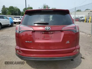 2018 Toyota RAV4 LE with VIN JTMBFREV2JD233808, listed as a Copart auction lot 59021235 with 71,430 mi miles and Salvage title. Bid and sale history available at DreamBid. Image 6.